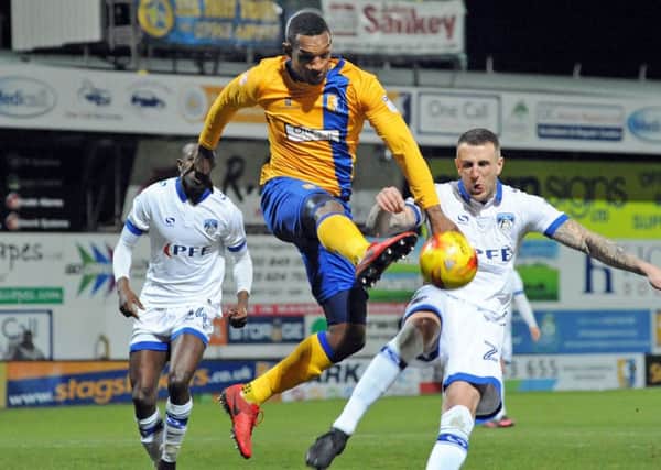 Mansfield Town v  Oldham Athletic.
Krystian Pearce brings the ball under his control a first half attack.