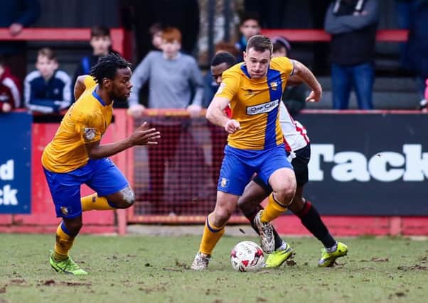 Mansfield Town's Lee Colins makes a break forward - Photo by Chris Holloway