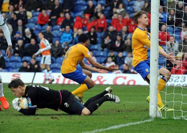 Mansfield Town v Plymouth Argyle.
Frustration shows late in the second half