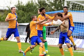 Mansfield Town v Notts County, Saturday October 8th 2016. Mansfield Town player Darius Henderson celebrates after scoring the 3rd goal. Picture: Chris Etchells