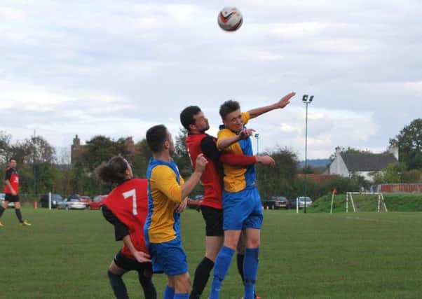 Tremere Lindo and Jonathan Jenkinson in action for Linby Colliery this season. PHOTO:  Ellena Hutchinson