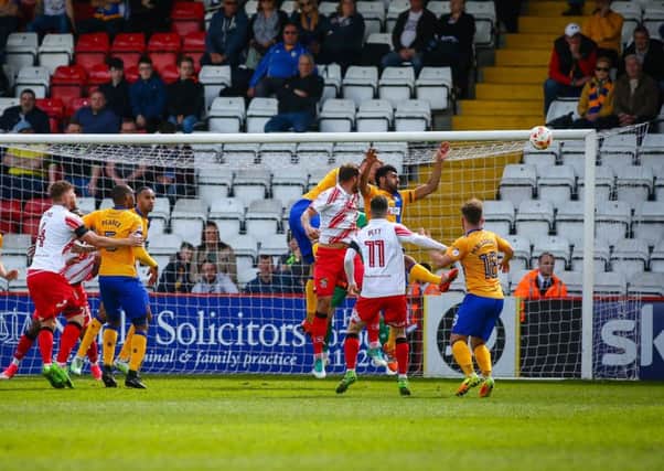 Mansfield Town's defence holds strong - Photo by Chris Holloway