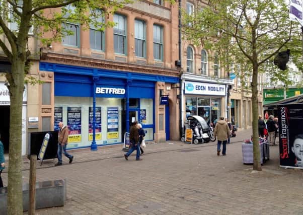 A man has been arrested in connection with a knife-point robbery at Betfred bookmakers in Mansfield Market place. Photo: Dan Hobson