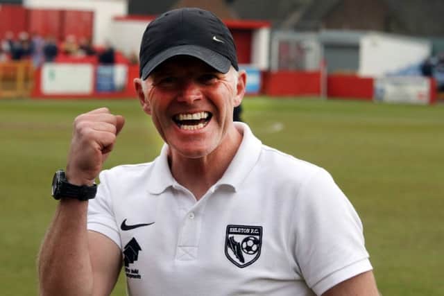 Selston manager Craig Weston celebrates at the final whistle.