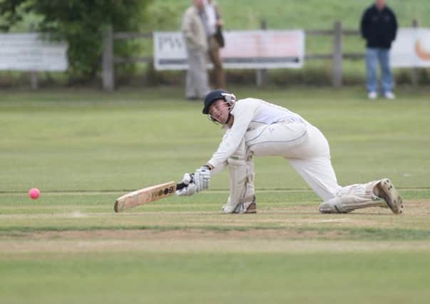 A trademark sweep shot from Tom Ullyott, who top scored with an unbeaten 68 in tabletopping Cuckneys match at home to Mansfield Hosiery Mills. (PHOTO BY: Richard Parkes)