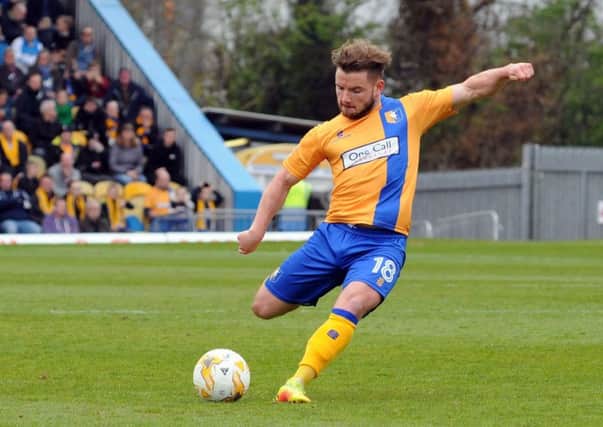 Mansfield Town v Portsmouth.
Alex MacDonald takes a first half shot at goal.