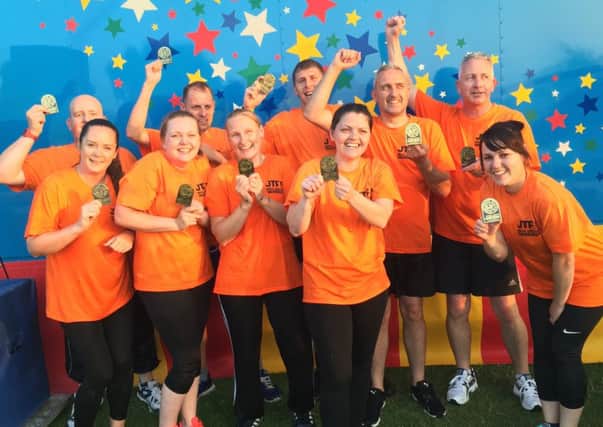 JTF, from Hucknall, the triumphant winning team in the second Active Ashfield Games Its A Knockout competition at Kingsway Park in Kirkby.