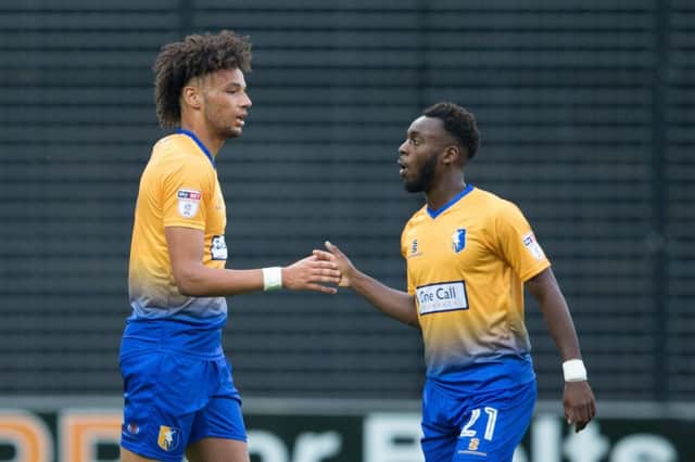 Mansfield Town vs Middlesborough - Lee Angol celebrates his goal with Omari Sterling-James - Pic By James Williamson
