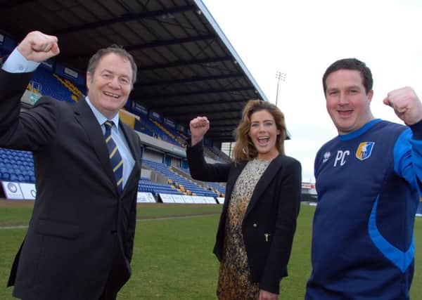 Mansfield Stags celebration.

Pictured L to R are; Chairman John Radford, Chief Executive Officer Carolyn Stills and Manager Paul Cox.