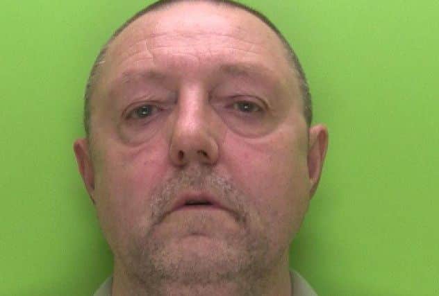 JAILED: Alan Carlson.