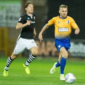 Mansfield vs Lincoln - Alfie Potter of Mansfield Town brings the ball forward - Pic By James Williamson