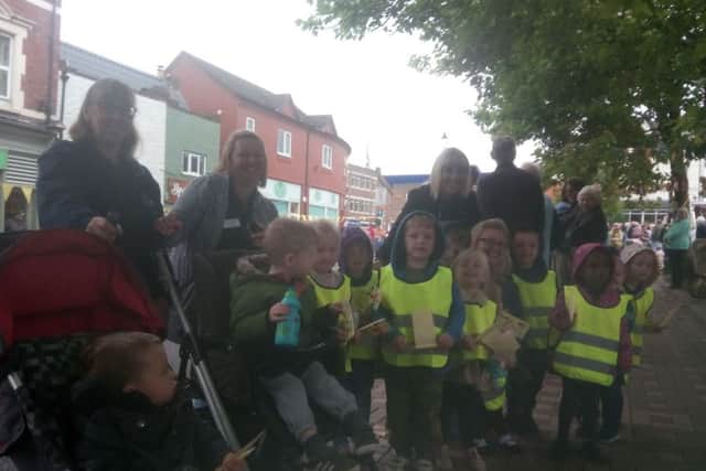 Toddlers from Tiny Tots in Hucknall turned out with homemade flags
