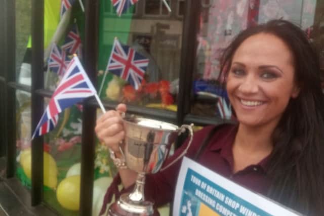 Lynnette Scott, owner of Bliss Boutique, won first prize for her Tour of Britain window display