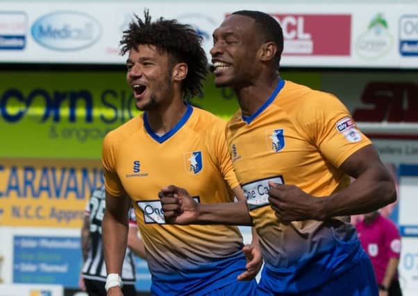 Mansfield Town v Grimsby Town - Krystian Pearce of Mansfield Town celebrates his first goal with Lee Angol - Pic By James Williamson