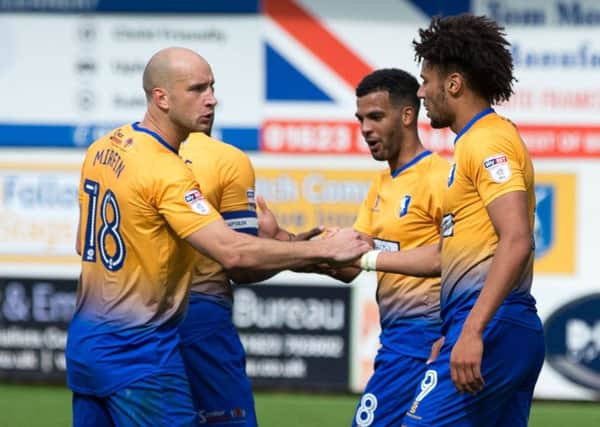 Mansfield Town v Grimsby Town - Lee Angol of Mansfield Town celebrates his second goal from the penalty spot - Pic By James Williamson