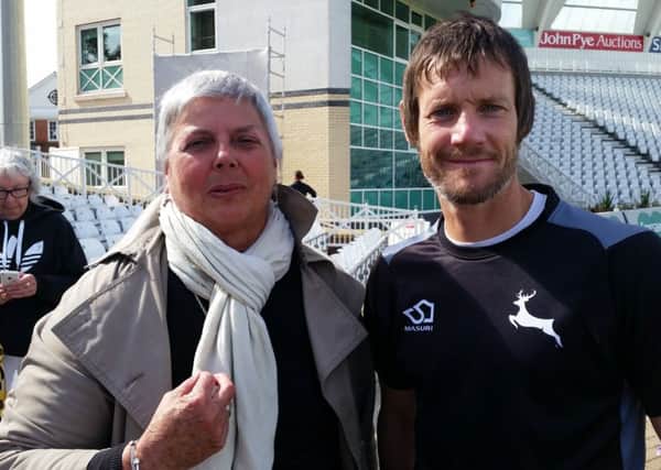 Retiring Nottinghamshire CCC captain Chris Read with Diana Peasey, who made the cheque presentation.