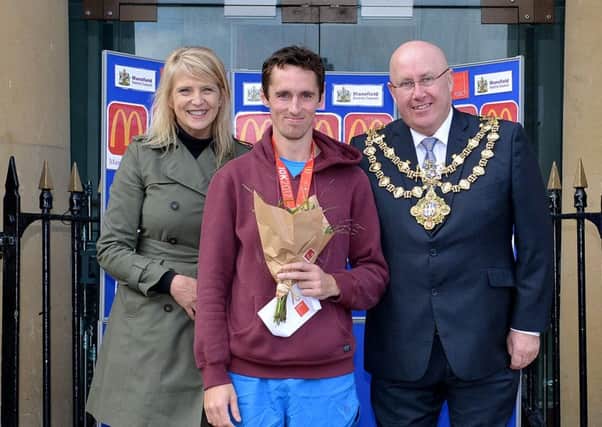 Mansfield 5 and 10k, Mens 10k, 1st placed Stuart King pictured with Jackie Moore of sponsors Mcdonalds and Mansfield Deputy Mayor Coun Mick Barton