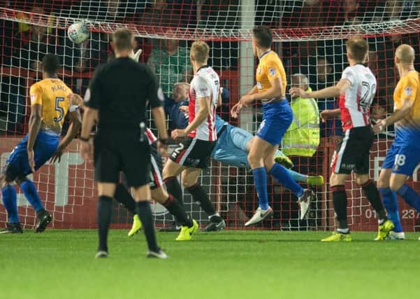 Cheltenham Town v Mansfield Town - Brian Graham of Cheltenham Town gives his side the lead - Pic By James Williamson