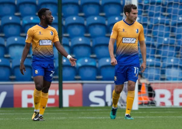 Colchester United vs Mansfield Town - Omari Sterling-James and Will Atkinson of Mansfield Town after Colchester take the lead - Pic By James Williamson