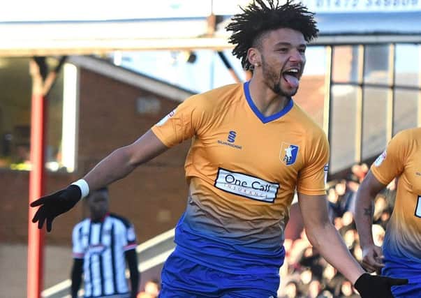 Picture Andrew Roe/AHPIX LTD, Football, EFL Sky Bet League Two, Grimsby Town v Mansfield Town, Blundell Park, 26/12/17, K.O 1pm

Mansfield's Lee Angol celebrates his equaliser

Andrew Roe>>>>>>>07826527594