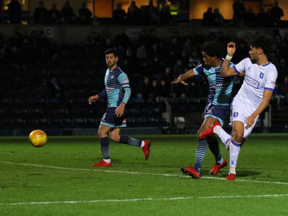 Lee Angol nets the winner at Wycombe. Photo by Howard Roe.