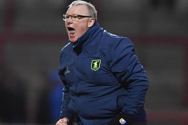 Mansfield Town manager Steve Evans celebrates victory: Picture by Steve Flynn/AHPIX.com, Football: Skybet League Two match Morecambe -V- Mansfield Town at Globe Arena, Morecambe, Lancashire, England on copyright picture Howard Roe 07973 739229