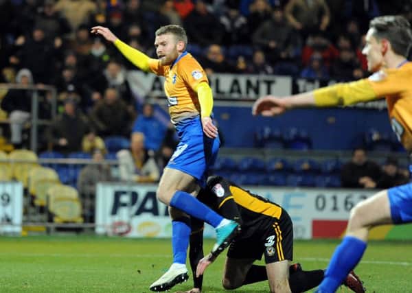 Mansfield Town v Newport County
Alfie Potter watches his shot find the back of the net for the Stags second goal of the first half.
