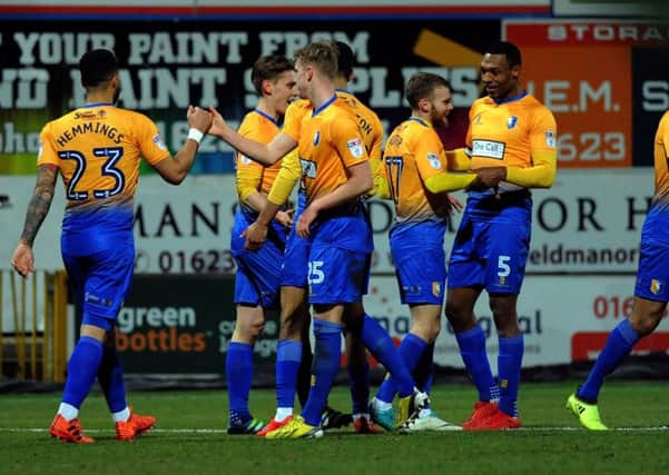 Mansfield Town v Newport County
Alfie Potter after scoring his hat trick gets congratulaions from Krystian Pearce and team mates.