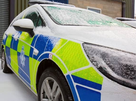 Police car in the snow