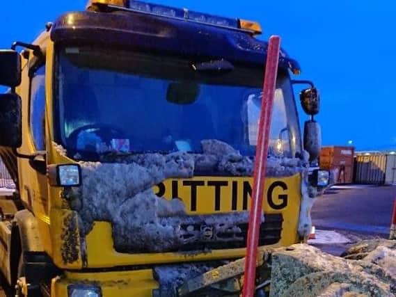 A gritter returns to the depot this morning.