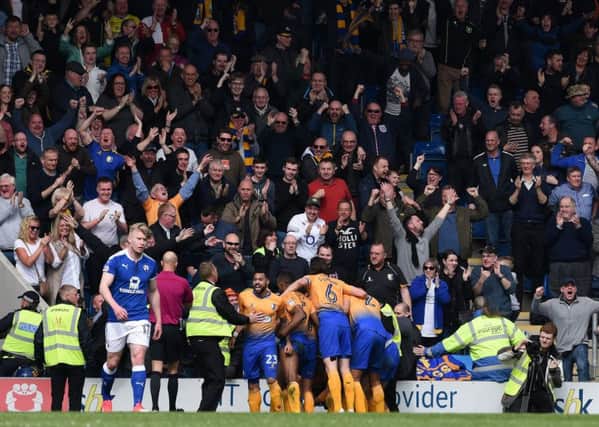 Picture Andrew Roe/AHPIX LTD, Football, EFL Sky Bet League Two, Chesterfield v Mansfield Town, Proact Stadium, 14/04/18, K.O 1pm

Mansfield's players celebrate Mal Benning's winning goal

Andrew Roe>>>>>>>07826527594